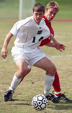 Bears senior forward Scott Siebers, here working against a defender earlier this season, tallied the game-winning goal in a 3-0 win over Case Western Reserve University Nov. 2 at Francis Field.