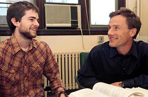 John E. McCarthy, Ph.D. (right), professor of mathematics in Arts & Sciences, and Greg Knese, a second-year mathematics graduate student, share a laugh in McCarthy's Cupples I Hall office. 