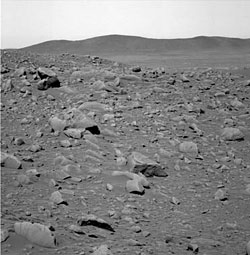 On to Columbia Hills (background).  Rover Spirit is wrapping up its tasks at Crater Bonneville.