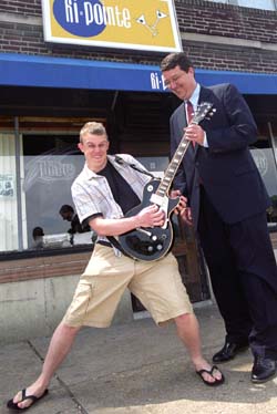 Mark W. Smith, J.D. (right), associate dean for student services, saw School of Law student Jayson Clark perform with his band at the Hi-Pointe, a St. Louis bar. 