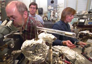 Alexander Meshik (foreground), Charles Hohenberg and Olga Pravdivtseva combined a selective laser with ion-counting mass spectrometry to find out how the world's only natural nuclear chain reaction site worked.