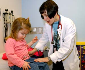 Abby S. Hollander, M.D., gives Grace Warnecke a diabetes check-up.