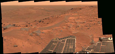 This mini-panorama was taken by Spirit on Aug. 23, 2005, just as the rover finally completed its intrepid climb up 