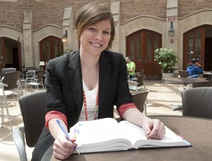 Smith studies in Crowder Courtyard earlier this spring. After graduation, she will move to Portland, Ore., to advocate on behalf of Native American children.