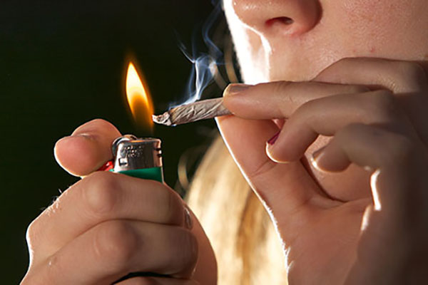 Marijuana dependence influenced by genes, childhood sexual abuse. (Image: Chuck Grimmett/Creative Commons)