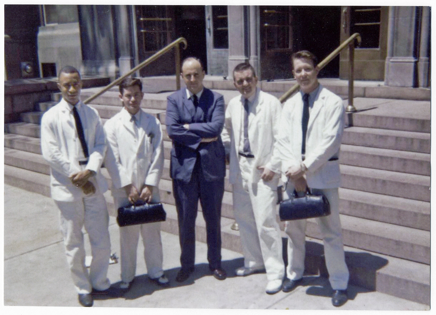 Medical rounds included ­working at Homer G. Phillips Hospital, then the city’s black public hospital. From left, James L. Sweatt III is pictured outside the hospital in 1960 with fellow classmates Luis Vasconez, a doctor, John Stone and Ed Stewart. (Courtesy photo)