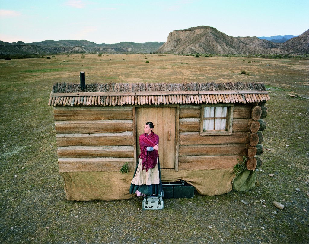 woman waiting by cabin