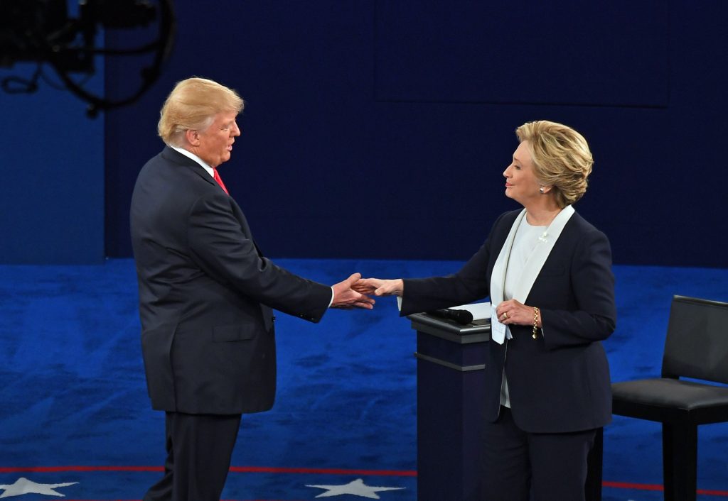 Presidential candidates Donald Trump and Hillary Clinton participate in a town hall meeting during the 2016 Presidential Debate at Washington University in St. Louis Sunday, Oct. 9, 2016. (Photo: James Byard/Washington University)