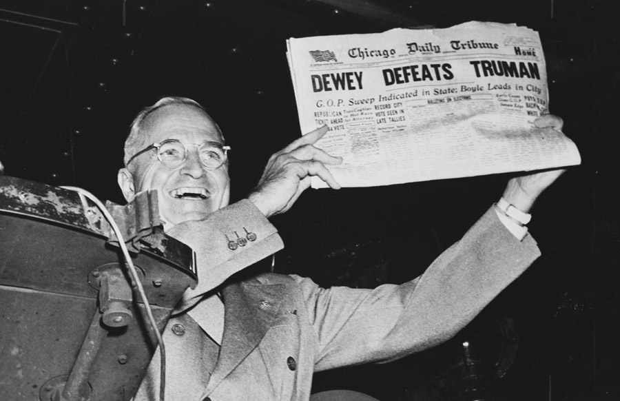 Harry S. Truman holding up the newspaper "Dewey Defeats Truman." (Photo: Truman Library)