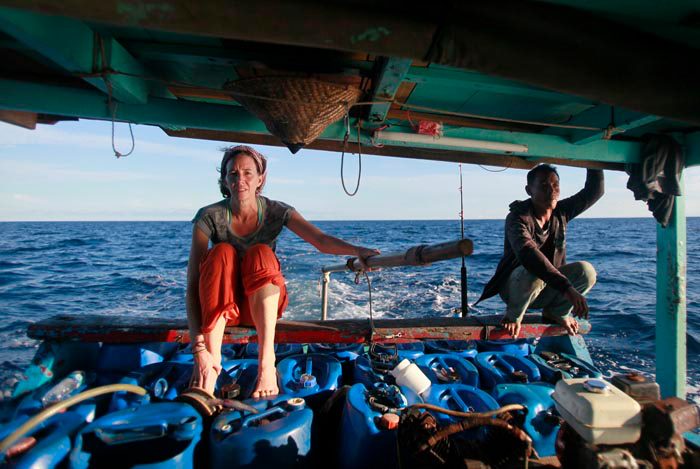 Robin McDowell rides on a boat on the Arafura Sea, off the southeastern coast of Indonesia, where the Thai fishing trawlers were operating. (Courtesy photo)