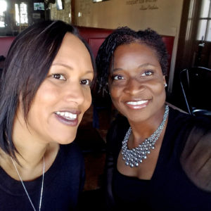 Kelly-Ann Henry (right), MBA ’00, is the first ever enterprise fraud consultant for Toyota Financial Services. She is pictured here with a friend. (Courtesy photo)