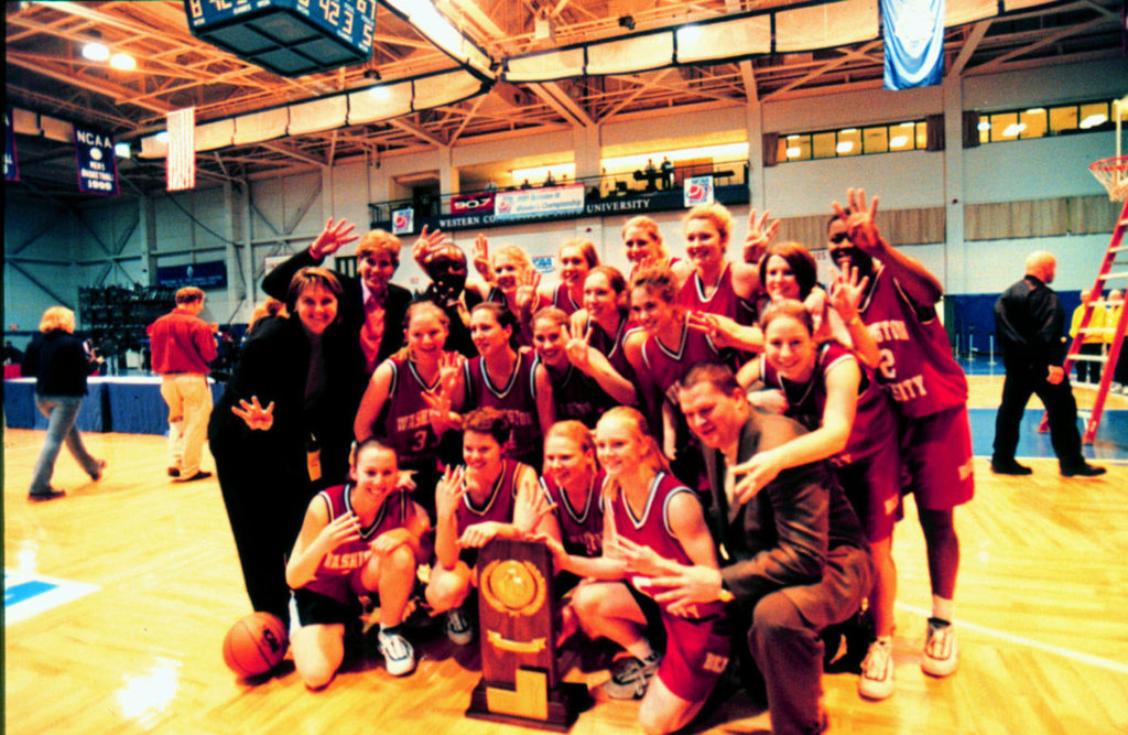 The women’s basketball team won four consecutive NCAA Division III Championships from 1998 to 2001. The 2001 victory earned a No. 19 spot in Champion magazine’s top 45 moments in women’s collegiate sports, celebrating Title IX’s 45th anniversary. (Washington University Archives)
