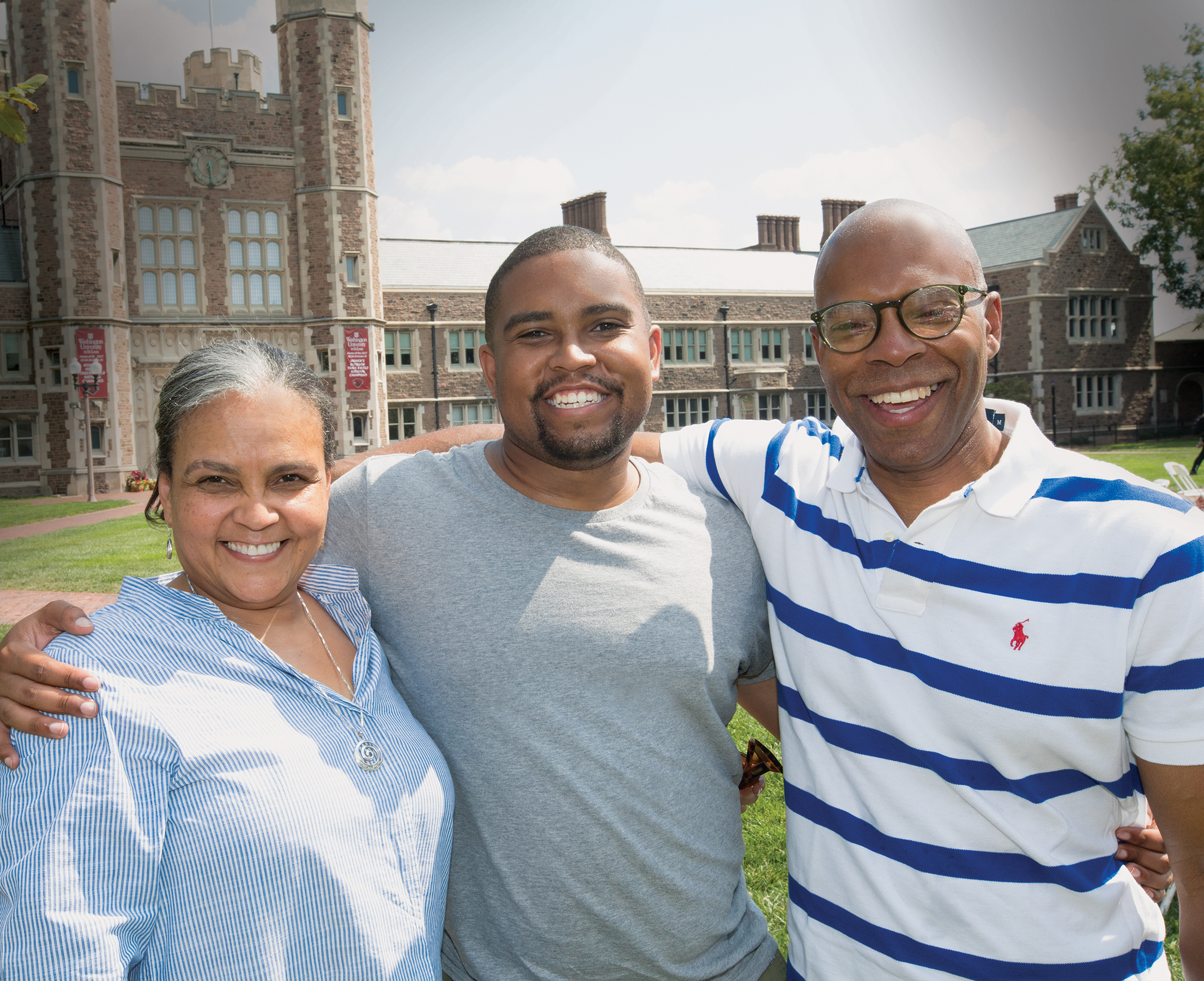 Solomon Brown (­center), AB ’14, who earned his JD in 2017, attended anniversary events with his mother, Debra Knight Brown, and father, Homer Brown. (Sid Hastings/WUSTL Photo)