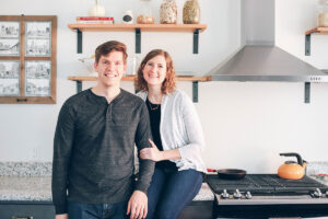 couple in their rehabbed kitchen