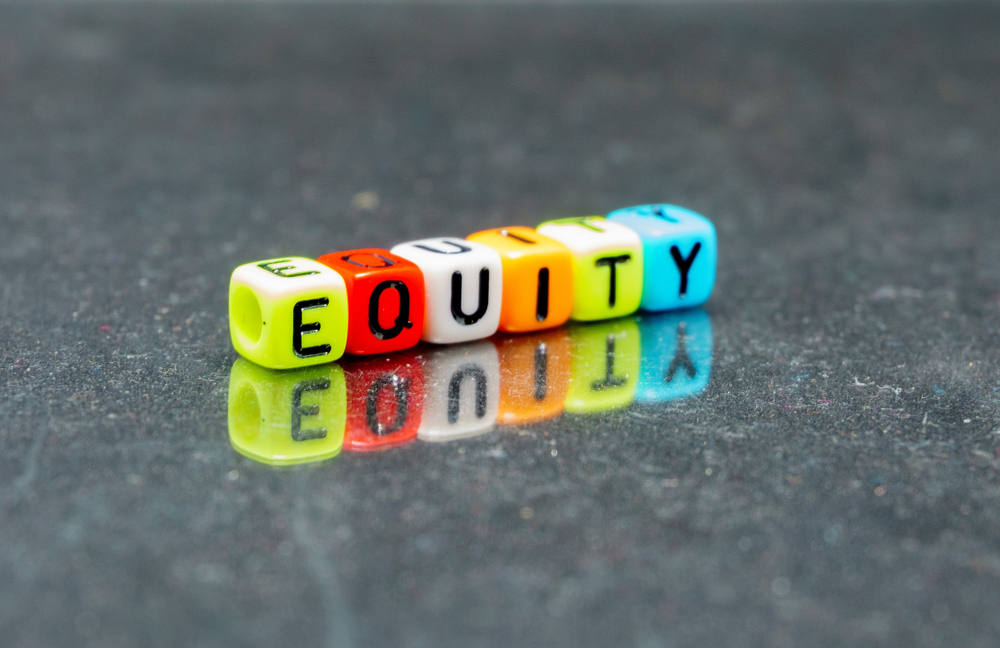 Equity spelled out in beads
