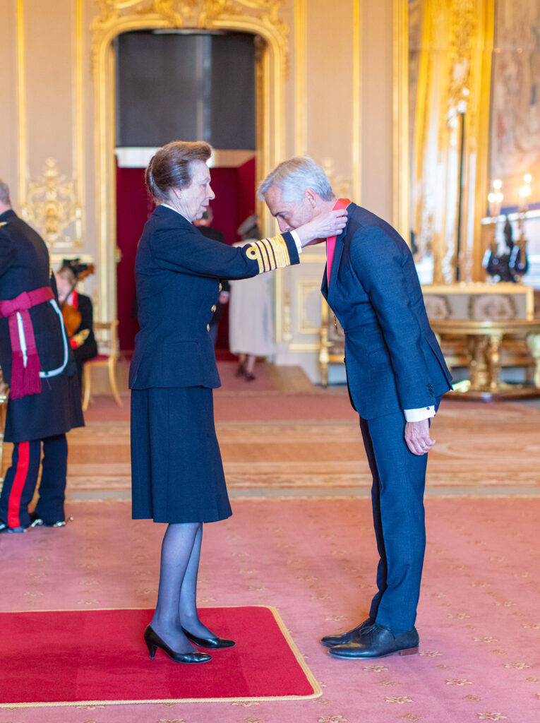 In March 2022, Russ Shaw visited Windsor Castle, where he attended (along with his wife, Les-ley) an Investiture led by HRH Princess Anne, who presented Shaw with a Commander of the British Empire (CBE) medal. (Courtesy photo)