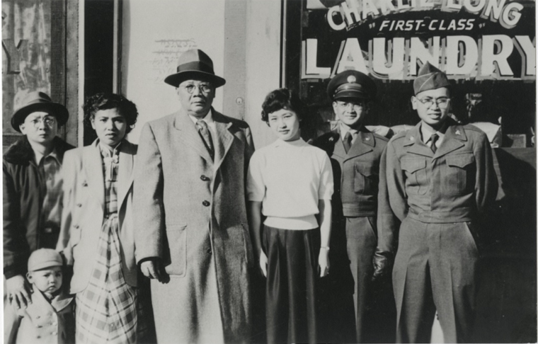 Private James Jewick poses with family in old Chinatown, St. Louis