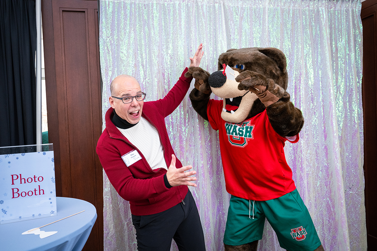 Mike Mazzeo poses with WashU Bear mascot