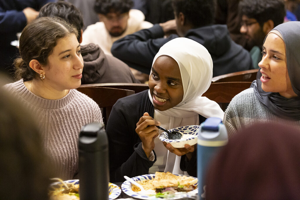 students at an interfaith dinner
