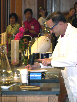 Chancellor ¡°Magic¡± Mark S. Wrighton drives nails made of rubber exposed to liquid nitrogen during his chemistry magic show.