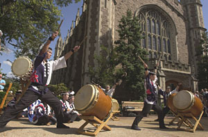 The St. Louis Osuwa Taiko Drummers provide birthday party guests with a taste of Japanese ceremonial drumming as they performed Sunday afternoon near Graham Chapel. Taiko, which means 