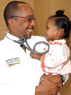 Michael R. DeBaun, M.D., shares a smile with Randice Reed. Randice has sickle cell disease, which affects one in 400 African-American infants - and 20 percent of those children will suffer a silent stroke before they finish high school.