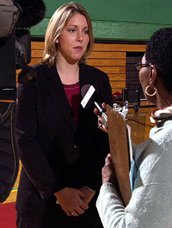 Michelle T. Miller, president of Student Union, speaks with a reporter after the Nov. 6 news conference. Any debate tickets that may be assigned to the University will be distributed only to students, who will be selected in a University-wide lottery.