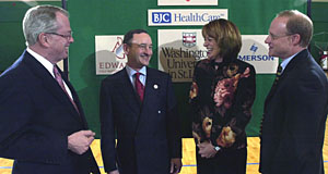 (From left) Robert L. Bagby, chairman and chief executive officer of A.G. Edwards; Chancellor Mark S. Wrighton; Pat Mercurio, president of Bank of America-Missouri; and Steven H. Lipstein, president and chief executive officer of BJC HealthCare, visit before the Nov. 6 presidential debate news conference.