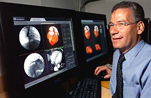 Achi Ludomirsky, M.D., the new director of pediatric cardiology, reviews images of a patient with congential heart disease. 