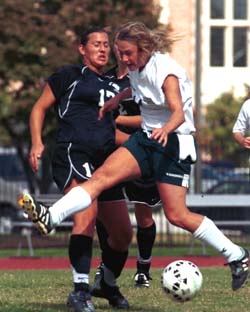 Junior midfielder Kara Karnes battles in a game this season at Francis Field. Karnes had six goals and three assists this year for the Bears, who finished 14-3-3, 5-1-1 in the University Athletic Association.
