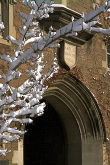 Umrath Hall archway with snowy branch