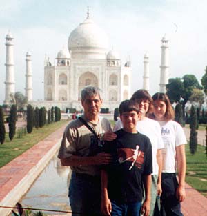 Mark Manary with his family, (from left) Micah, Mardi and Megan, in front of the Taj Mahal in India.