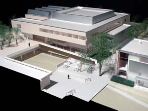 The Sam Fox Arts Center will break ground for two structures -- the Museum Building (at top in the model at left) and Earl E. and Myrtle E. Walker Hall (at right in the model) -- April 14. In the foreground is the Dula Foundation Central Courtyard.