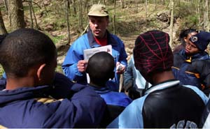 Jim Ligman, a teacher at Oak Hill Elementary School in the St. Louis Public School District, prepares his students on April 13 for an earth science program at Tyson Research Center.