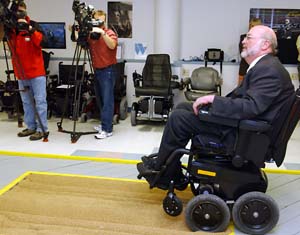 David Gray, Ph.D., demonstrates how the new INDEPENDENCE iBOT 3000 Mobility System traverses over sand at a news conference April 29 at the Enabling Mobility Center.