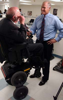 KTVI Fox 2 reporter Tom O'Neal interviews Gray about the innovative wheelchair.