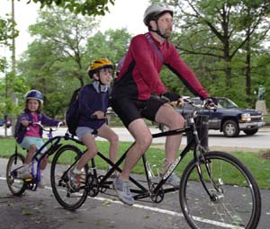 One of Nickerson's great pleasures in life is taking his children Will, 8, and Genevieve, 5 (and three-quarters!), to school on a tandem tag-along bike every morning.