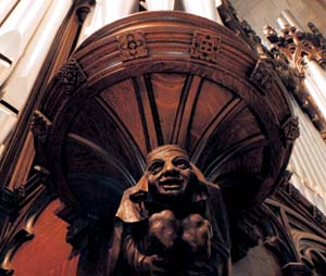One of the grotesques inside of Graham Chapel, beneath the organ pipes