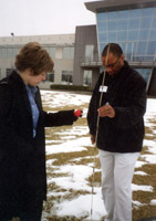 Heather Parrott and Jay Webb measure accelerations on a frozen field.