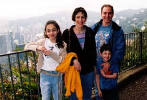 Abby Hollander with her husband, Craig, and children, Jenny and Ian, during a recent trip to Hong Kong.