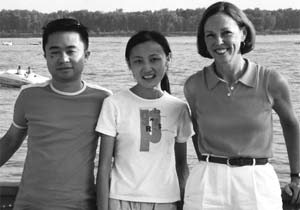 JoAnn Sanditz, current president of the Women's Society and a host parent, and biomedical engineering doctoral candidate Gang Xu and his wife, Weiqing Huang, enjoy the Great River Road. The Women's Society has implemented several programs over the years, including the 