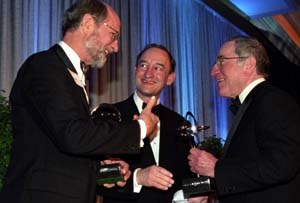 (From left) John F. McDonnell, Chancellor Mark S. Wrighton and Sam Fox share a laugh at the 38th annual William Greenleaf Eliot Society dinner April 13 at The Ritz-Carlton. McDonnell, who served as chair of the leadership phase of the Campaign for Washington University, and Fox, who chaired the campaign's public phase, were presented with the Search Award, the Eliot Society's highest honor.