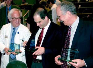 (From left) Robert J. Rothbaum, M.D., Martin I. Boyer, M.D., and Lewis R. Chase, M.D., celebrate receiving the Samuel R. Goldstein Leadership Awards in Medical Education at a recent ceremony in the Eric P. Newman Education Center. The annual awards — considered to be among the highest honors teachers at the School of Medicine can receive — recognize faculty members who have made outstanding contributions to medical education.