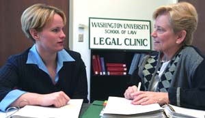 Andrea Ebreck (left) confers with Karen L. Tokarz, J.D., professor and executive director of the School of Law's nationally recognized clinical program. 