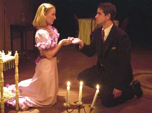 Emily Grosland as Laura with Matt Shapiro as Jim O'Connor in the Performing Arts Department's production of Tennessee Williams' *The Glass Menagerie*. The production was the centerpiece of an international symposium on the early career of the playwright, who was a student at Washington University in the mid-1930s.