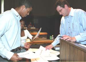 Steve Malter (right) teaching students to plan their academic life for their business career.