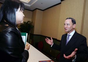 Washington University Chancellor Mark S. Wrighton discusses the formation of the McDonnell International Scholars Academy with Julianne Jungeun Lee of the Korea Times following the press conference Oct. 19 at the Overseas Press Club in New York City.