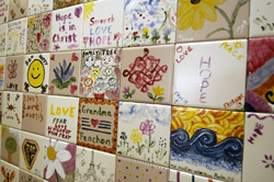 More than 400 tiles painted by cancer patients and their families are on dispaly in the Siteman Cancer Center.