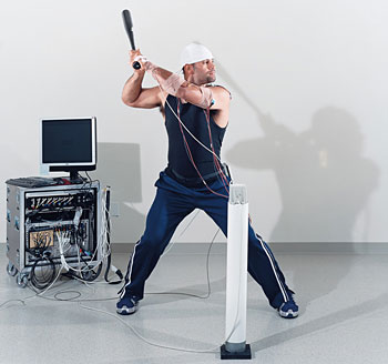 El Hombre vs. The Babe: Pujols swings a bat in the lab of Catherine Lang, assistant professor in physical therapy.