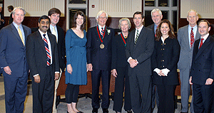 Present at the installation of James T. Little, Ph.D., as the first Donald Danforth, Jr. Distinguished Professor in Business are (from left) David Hollo, Donald Danforth Jr.'s son-in-law; Mahendra R. Gupta, Ph.D.; Christopher Danforth, Donald Danforth Jr.'s son; Elizabeth Little, Little's daughter; Little; Carolyn Danforth, Donald Danforth Jr.'s wife; Donald Danforth III, Donald Danforth Jr.'s son; John 